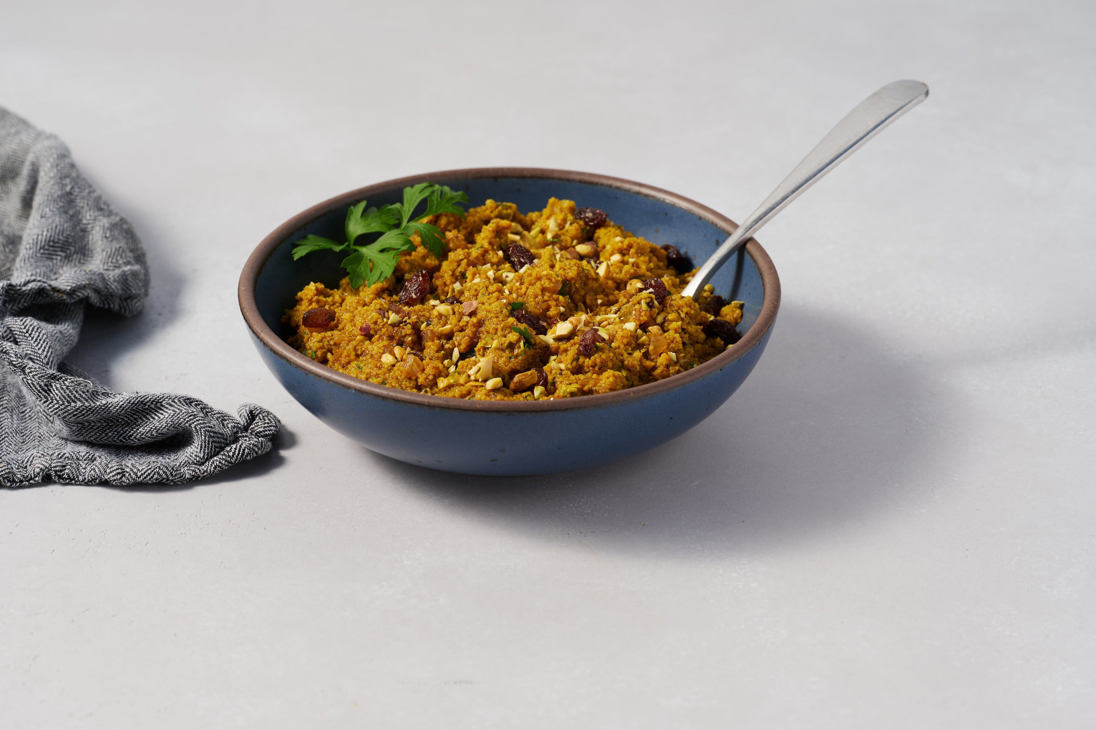 Golden Curried Fonio with Pecans and Raisins