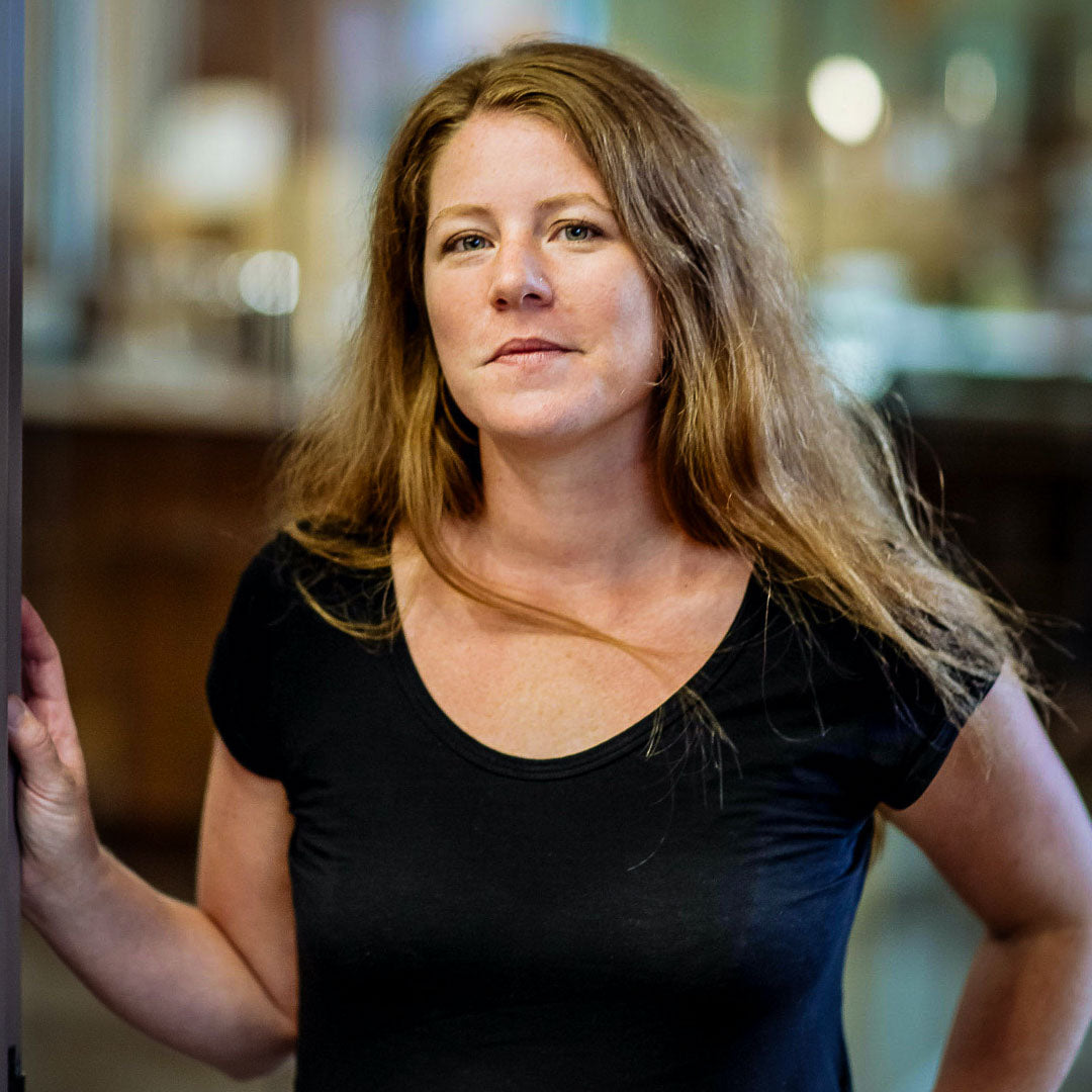 Woman wearing a black shirt in an indoor setting (Jamie Lamonde)